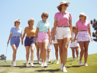 Women golfers on the fairway.